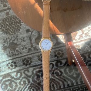 Raymond Weil 5515 gold watch face/leather